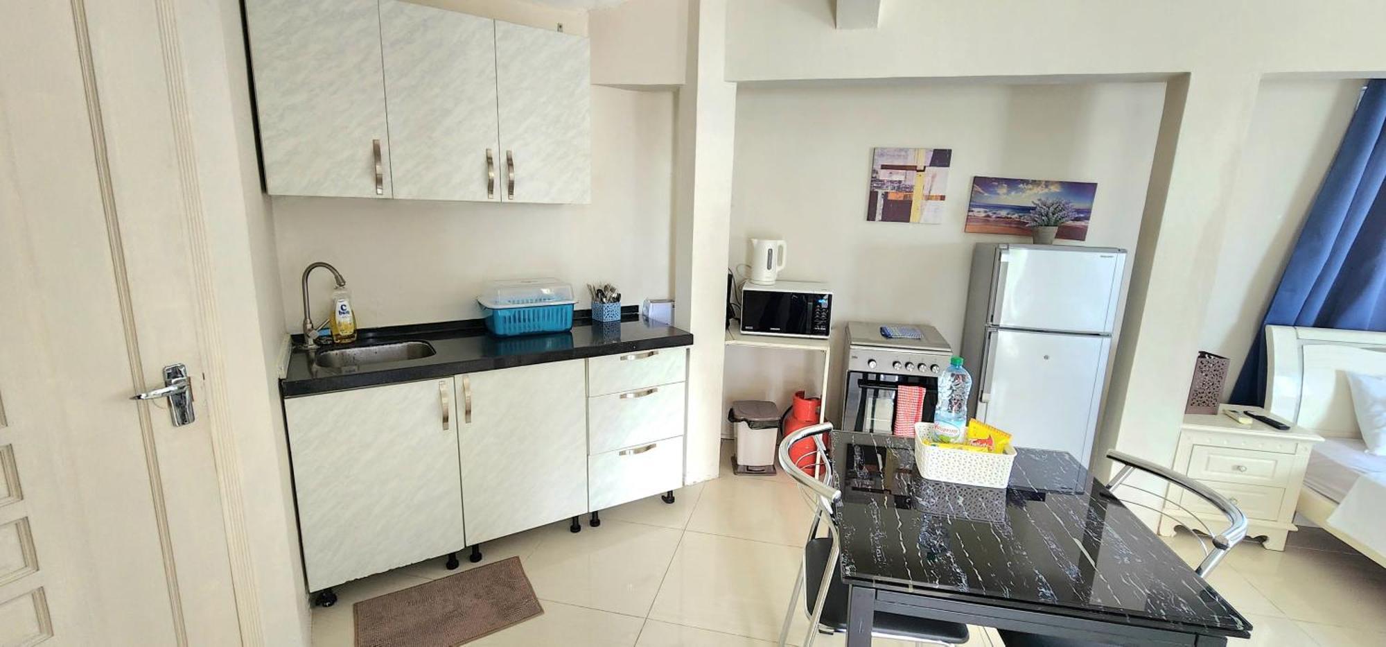 Lovely Studio Apartment With Views Of The Lagoon. غراند بايَ المظهر الخارجي الصورة